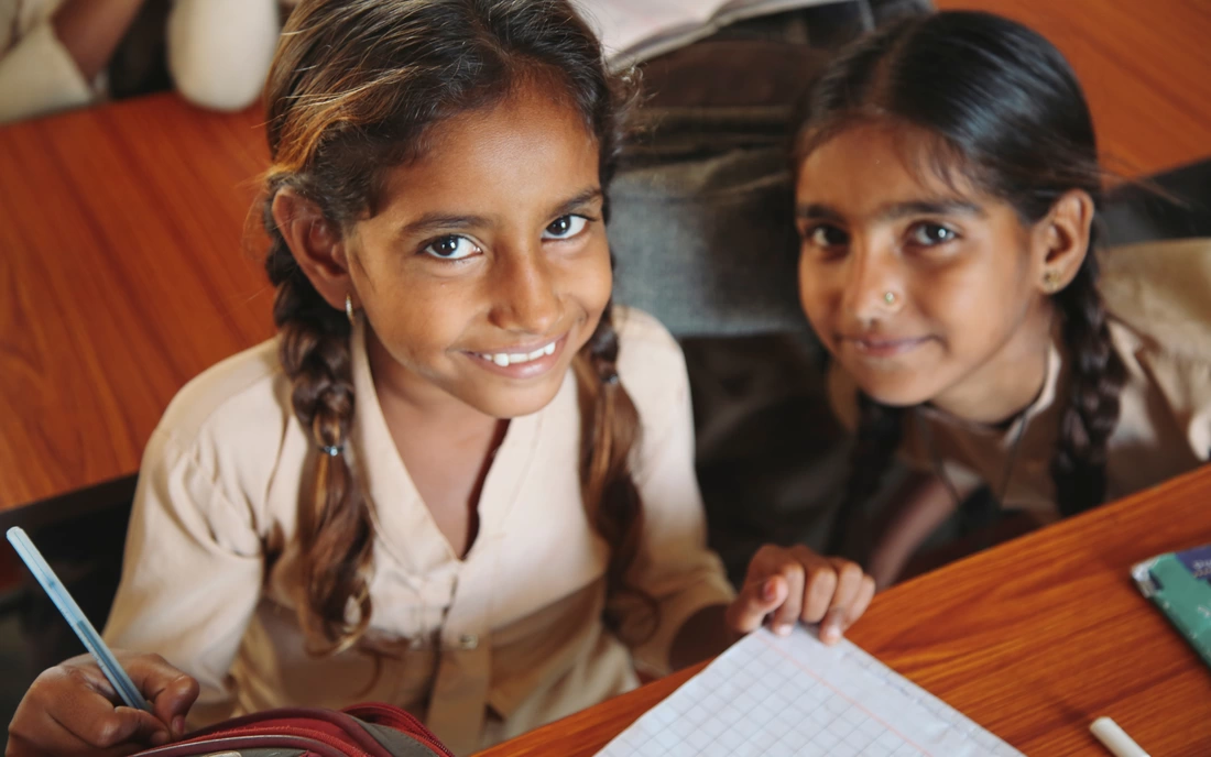 Educate Girls logo and children